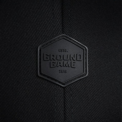 Kapa s ščitnikom Label (črna)